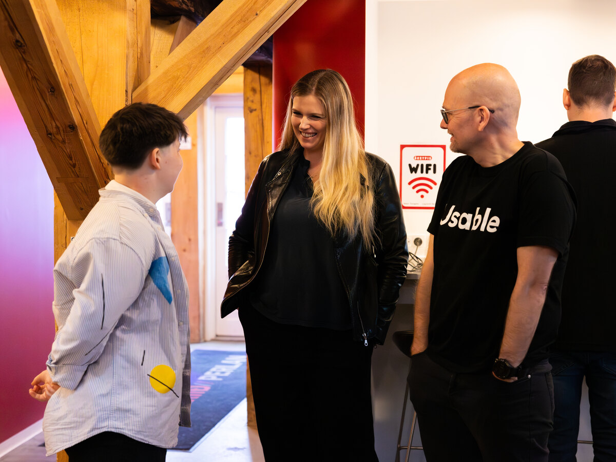 Participants talking between sessions at Usable Fragments 2026